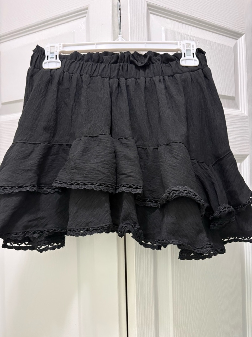 Black Tiered Ruffle Mini Skirt with shorts built in.
